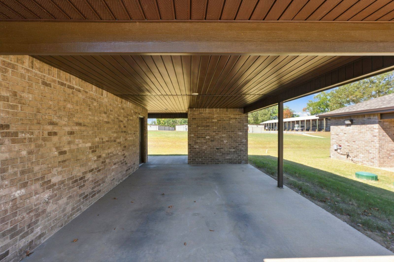 Covered carport beside the duplex
