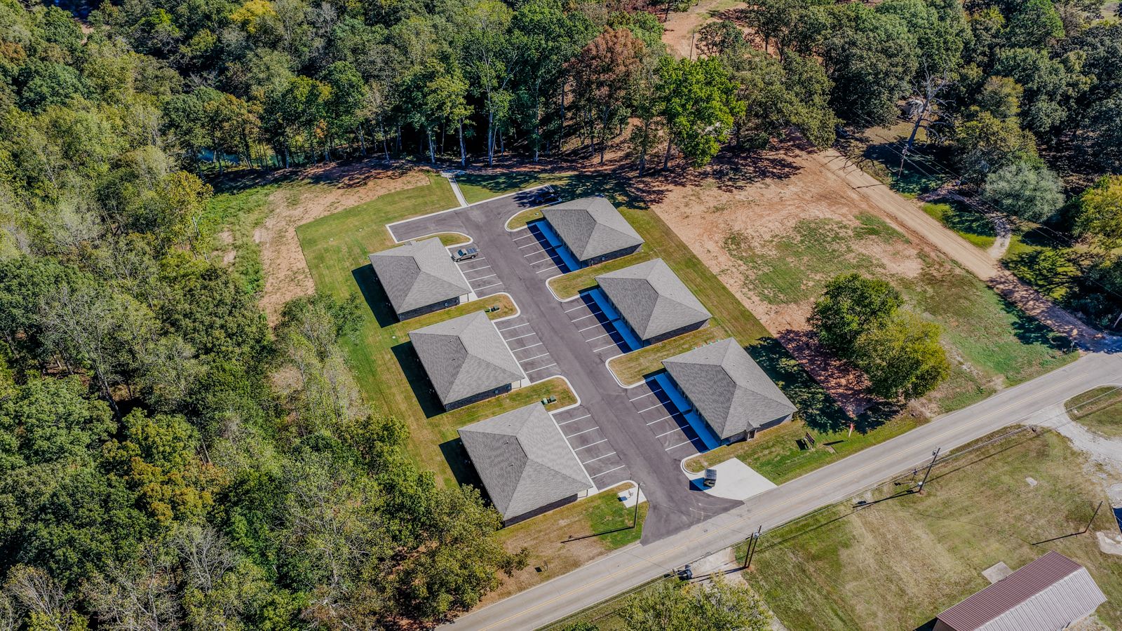 Aerial view of The Oaks at Whites Lake in the woods